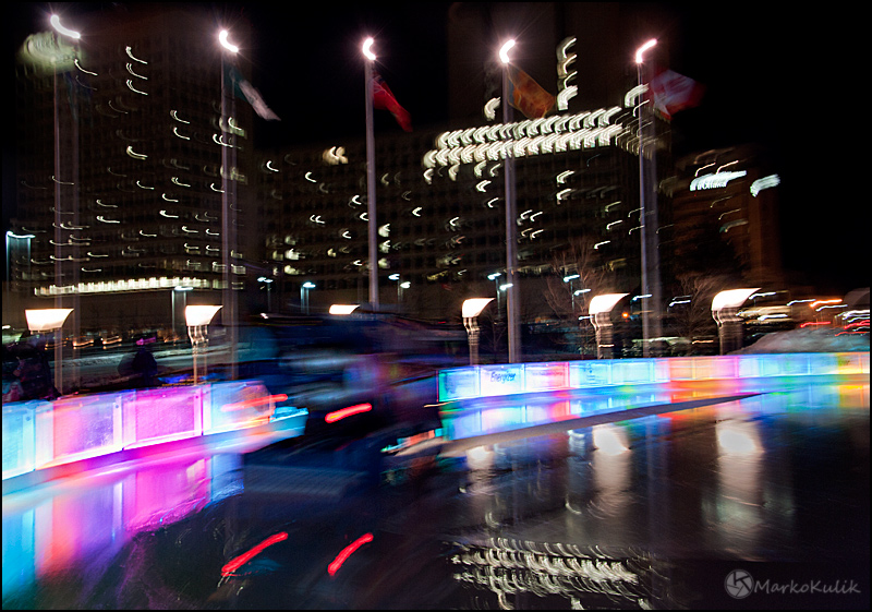 This image was taken at about 6:15 pm. I really dig the rink's colours, the city light reflections and of course, the Zamboni.